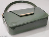 Green synthetic slingbag with 1 short shoulder strap and box pattern design, lightweight and smooth touch
